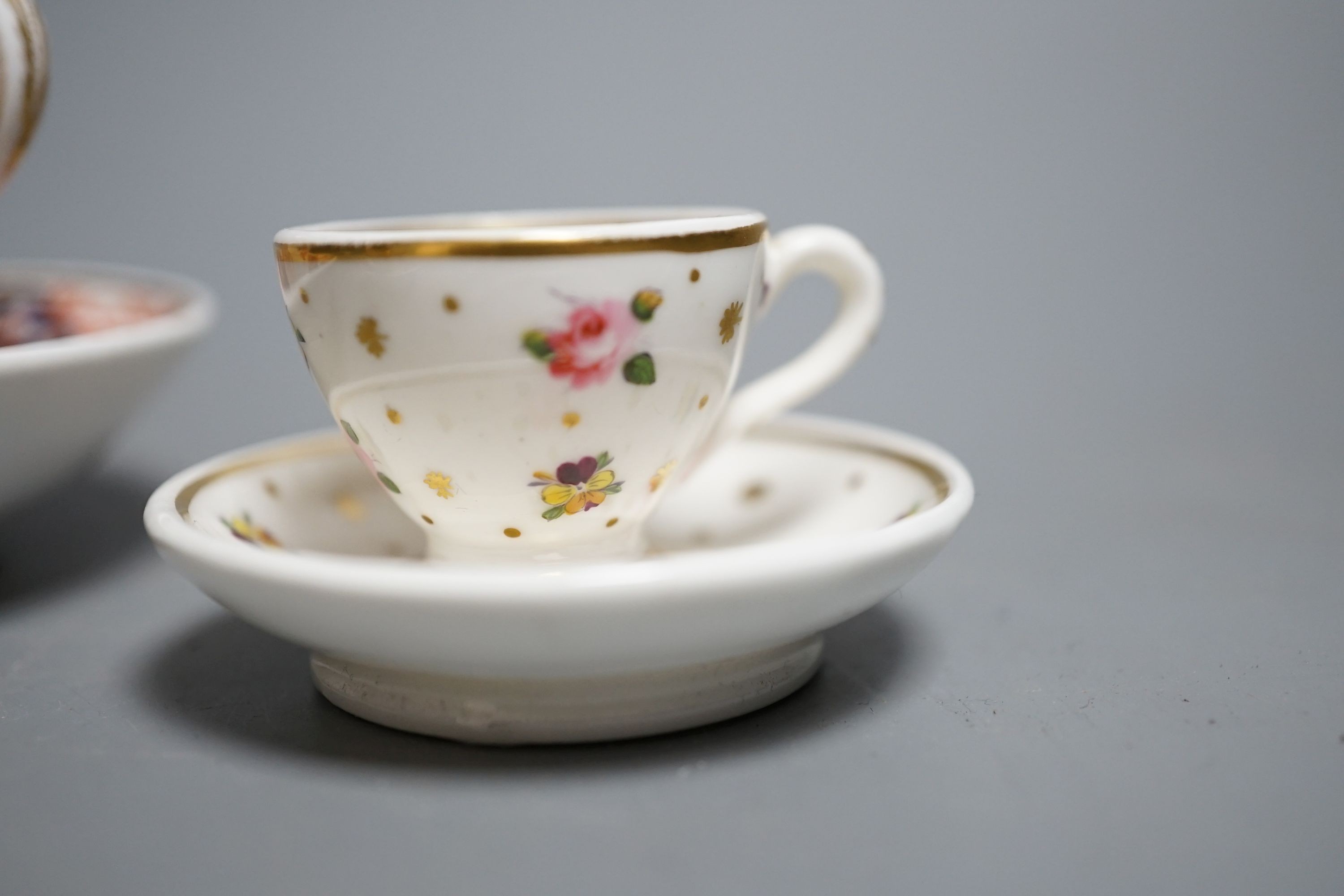 Three Spode miniature teacups and saucers, c.1815. Provenance - Mona Sattin collection of miniature cups and saucers, collection no.s 120, 121 & 130.